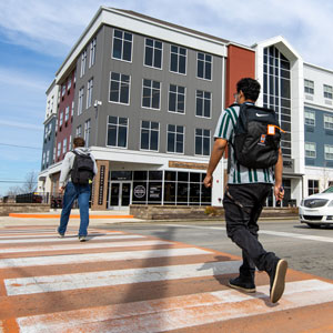 Student crossing at a crosswalk